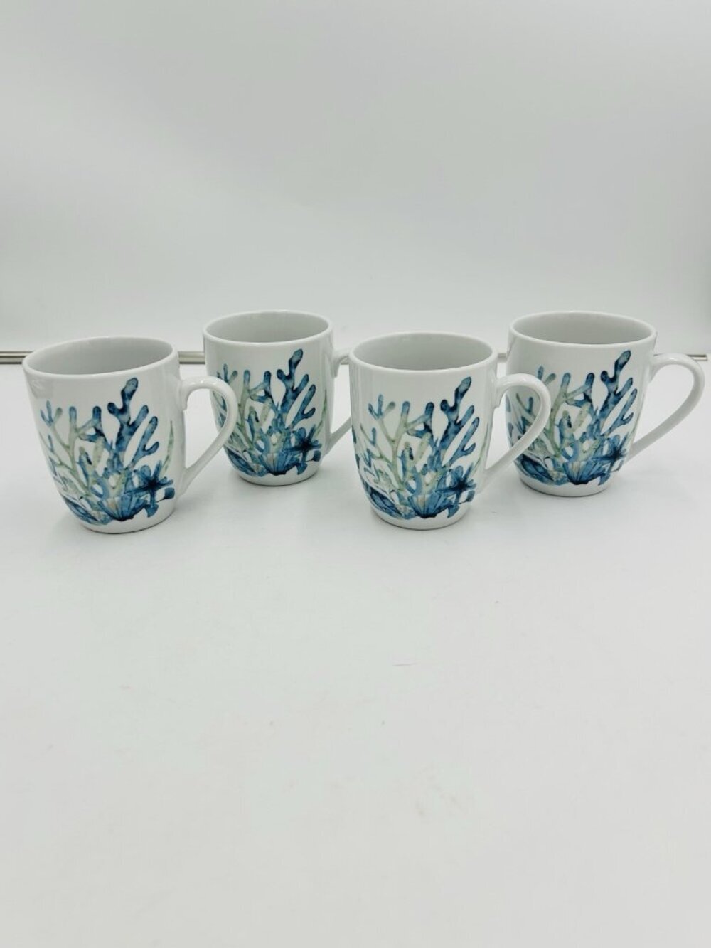 Fitz and Floyd Sanibel Blue Cups Mugs Set of 4 Porcelain Coral Design